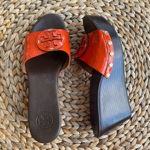Like new ToryBurch orange patent leather wedge sandals